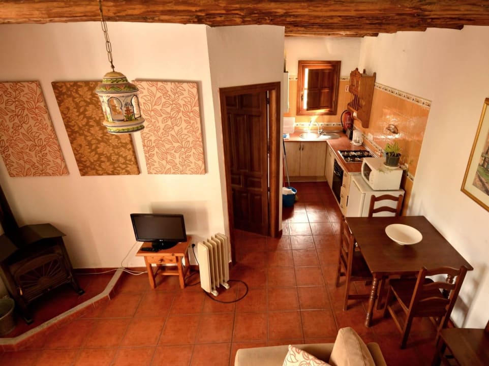 Living room with wood stove Casitas de la Sierra