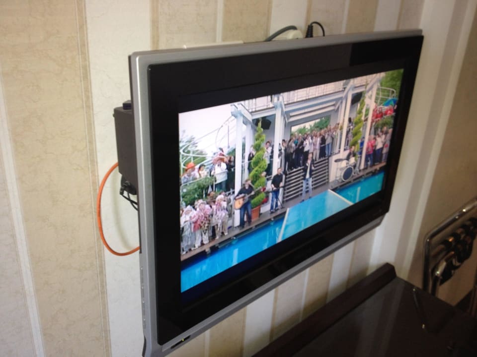 Fernseher im Deluxe-Zimmer Premier Le Reve Hotel & Spa