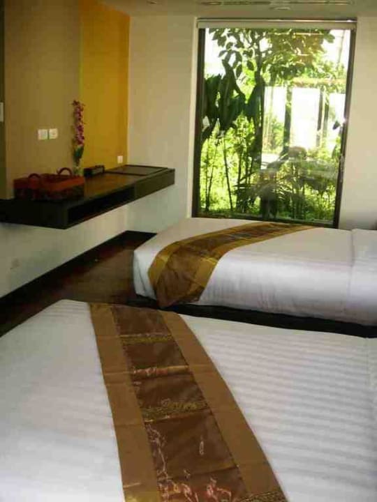 Zweites Schlafzimmer in der Familienvilla Hotel Niramaya Villa