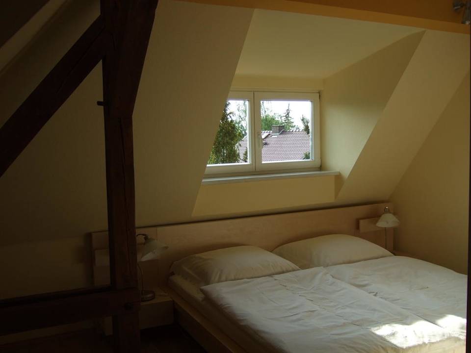 Schlafbereich mit Doppelbett Ferienwohnung Wiesner