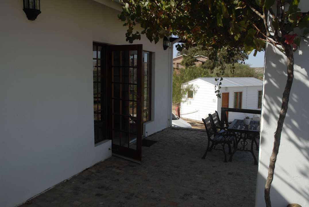 Terrasse/ Eingang Hotel Melkboomsdrift Lodge
