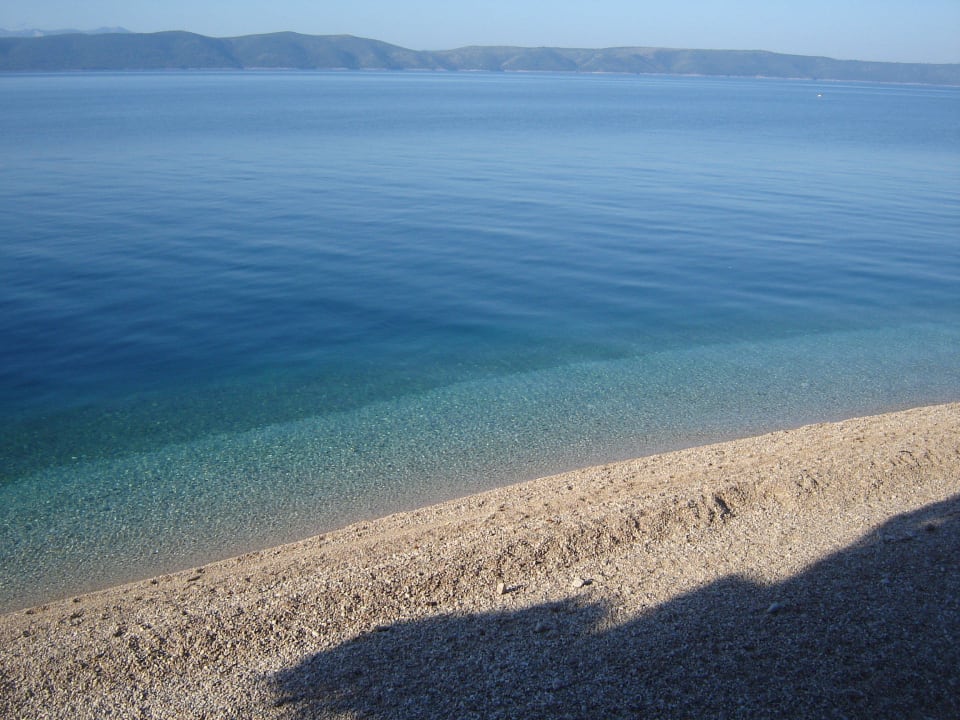 Ranní klid na pláži Hotel Punta