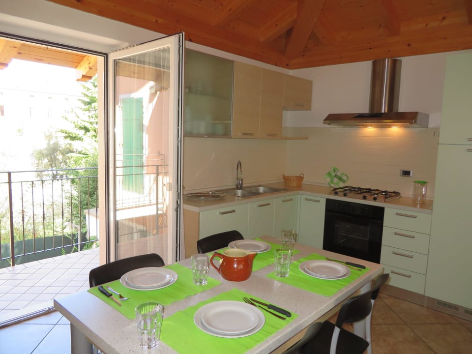 Soggiorno con angolo cottura in Villetta Bella Villa Apartments