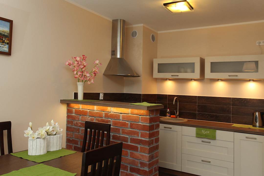 Salon z aneksem kuchennym Apartments Bursztynowe Komnaty