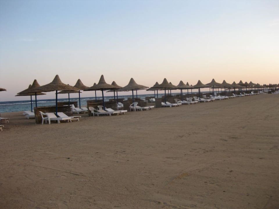 Strand bei Sonnenaufgang Utopia Beach Club