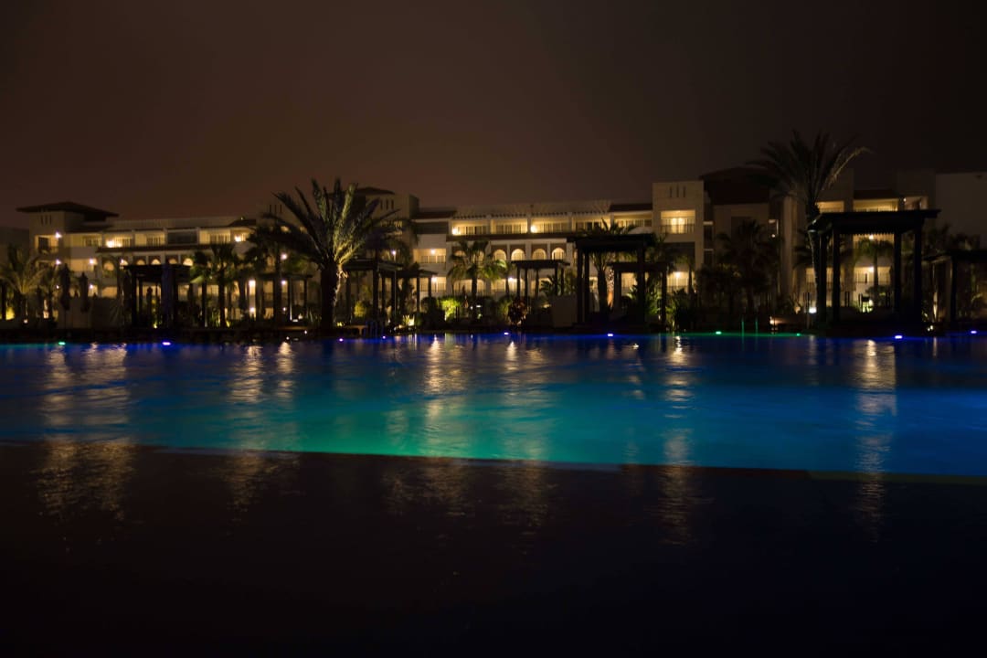 Pool und Hotel bei Nacht Hotel Riu Palace Tikida Agadir
