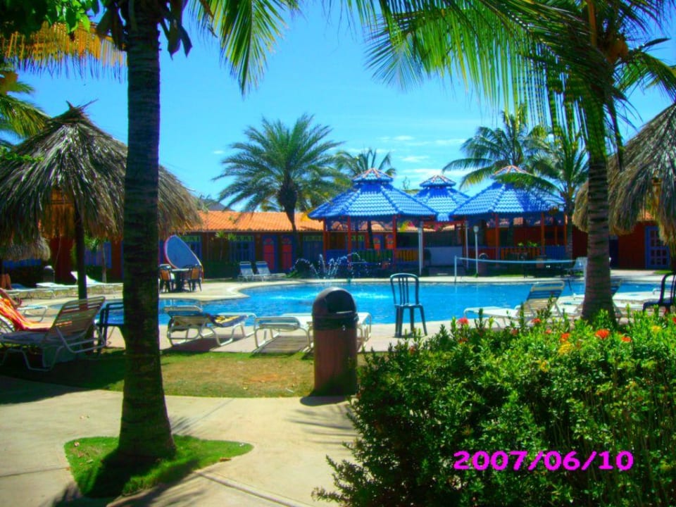 Pool im Gartenbereich Hotel Flamenco Villas / Beach Club