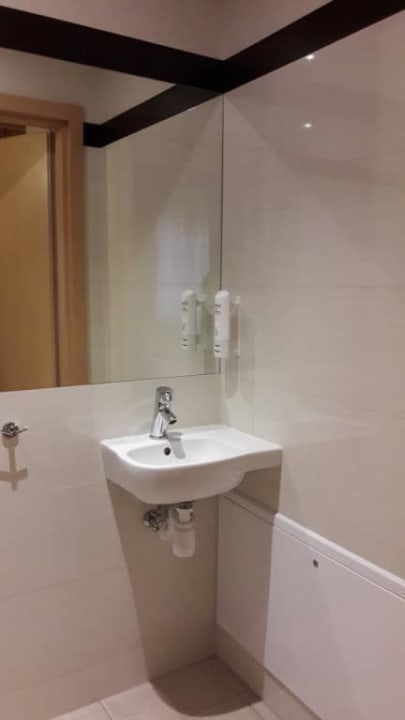 Łazienka przy salonie Hotel Rado