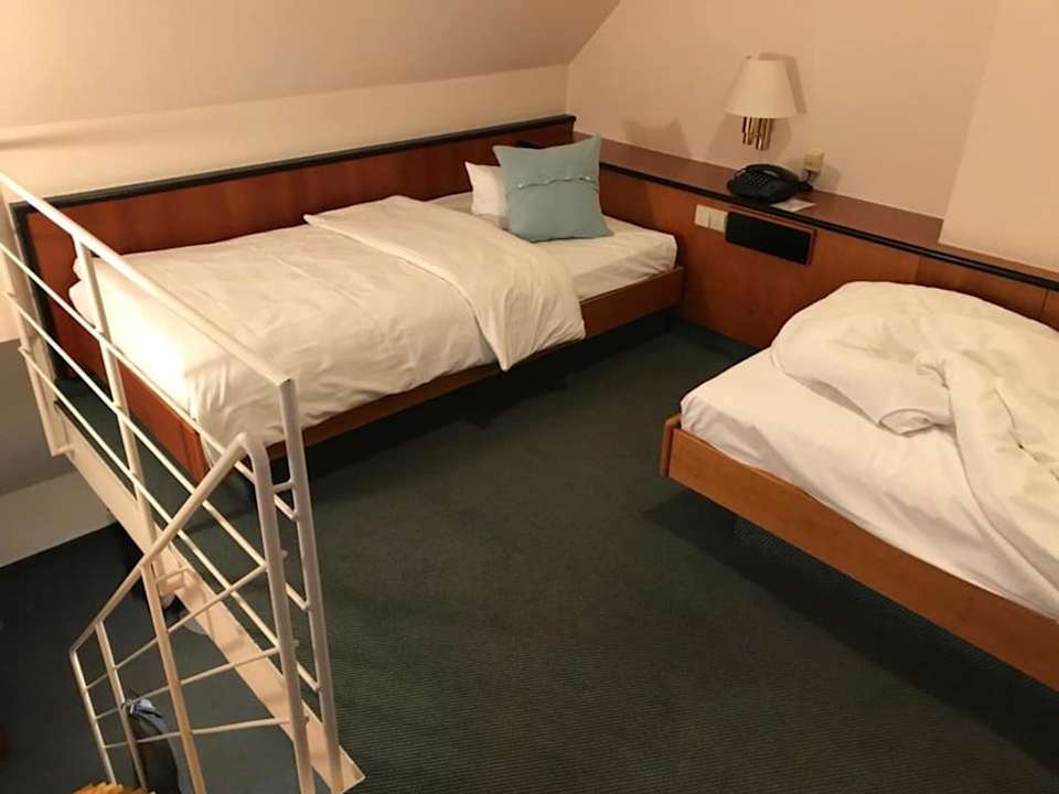 Top floor beds (room #312) Hotel Princess