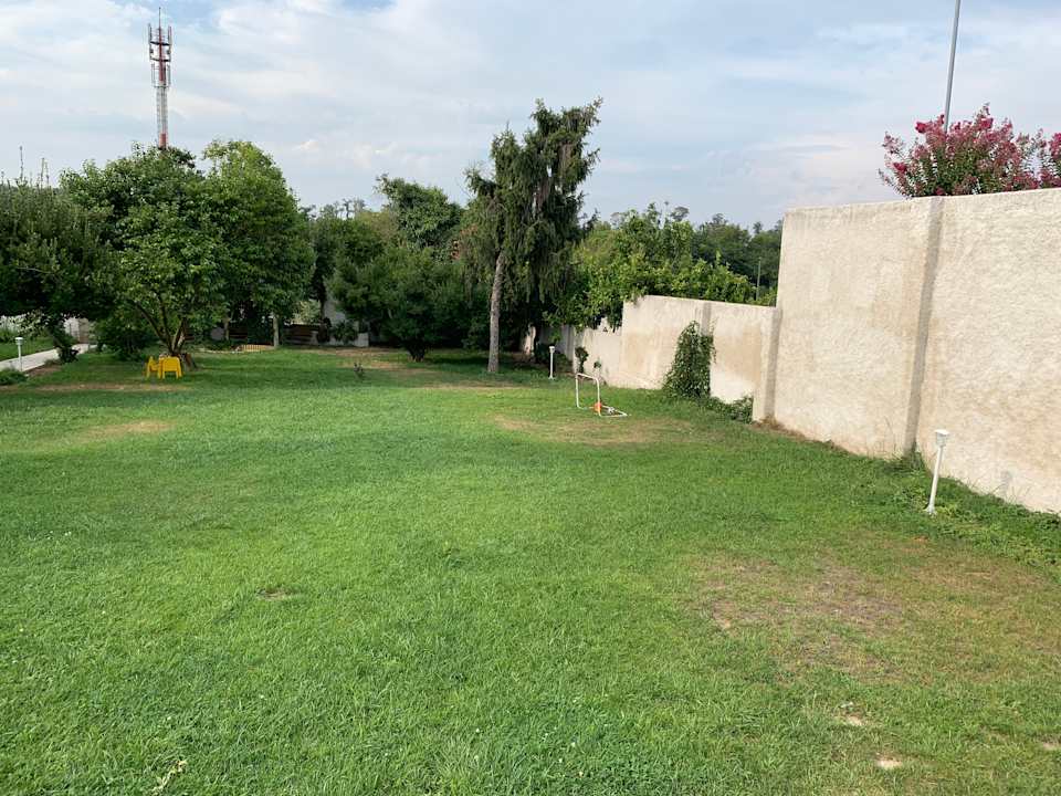 Gartenanlage Oryza Guest House & Suites