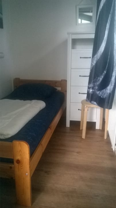 Ein Zimmer mit Einzelbett Het Grootslag Vakantiepark