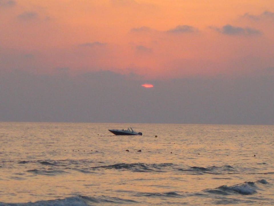 Sonnenuntergang am Strand Dream Family Club
