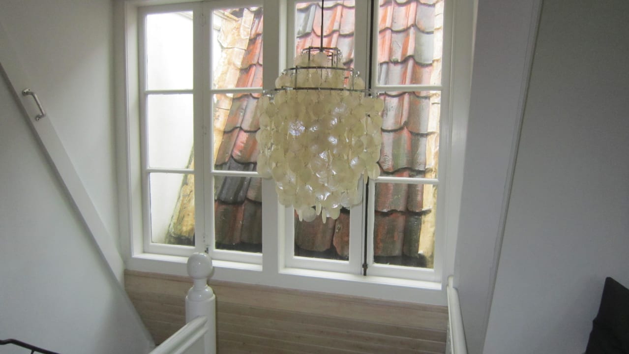 Одно из окошек Hotel Kalkmarkt Suites