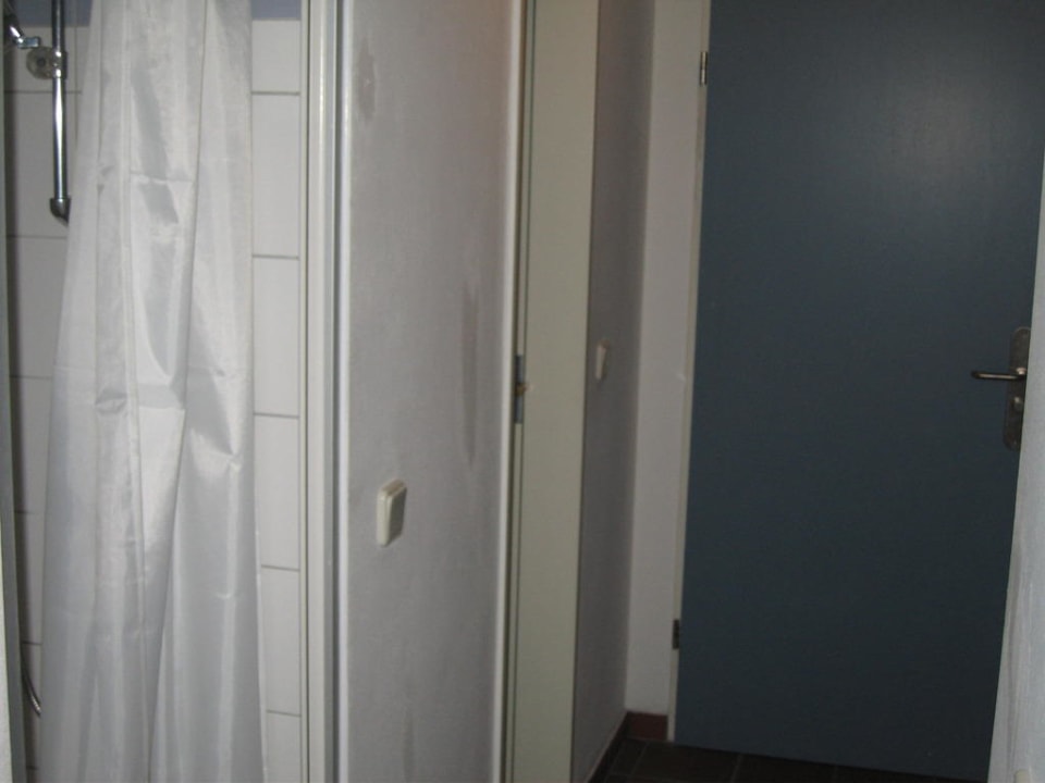 Dusche im Hausflur Apart Hotel Norden