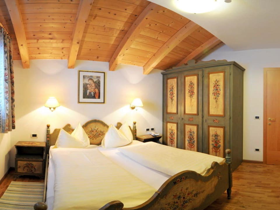 Camera mansardata stile tirolese Apart Residence Rautal