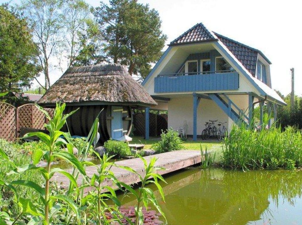 Romantische Stunden vor dem großen Gartenteich Ferienhaus Brise