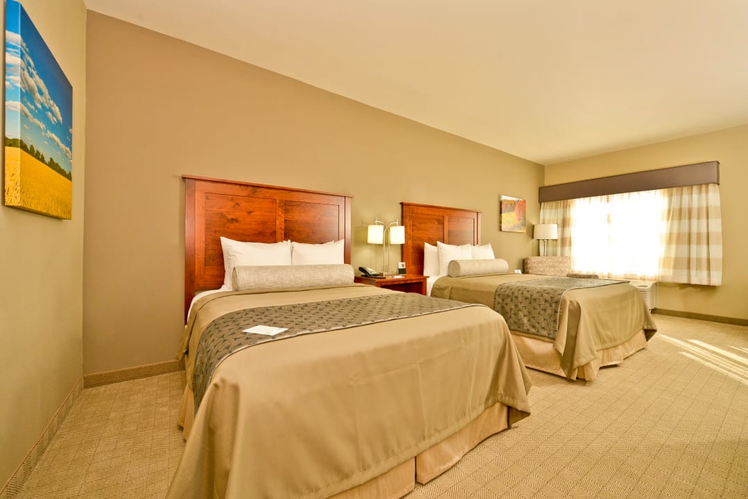 Zimmer Best Western Plus Green Mill Village Hotel & Suites