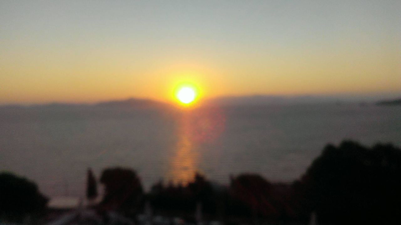 Vanaf balkon zonsondergang Woxxie Hotel