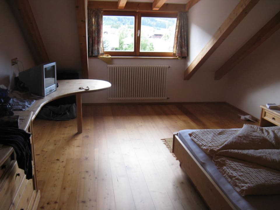 Schlafzimmer in der Tirolersuite Hotel Tharerwirt