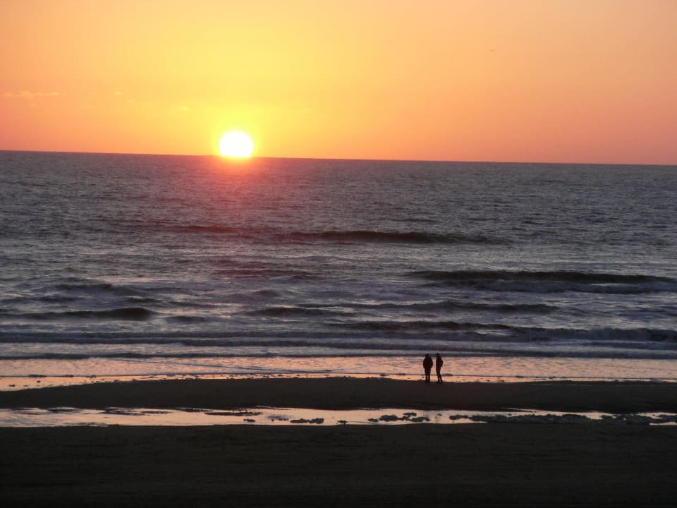 Strand mit Sonnenuntergang Strandhotel Golfzang