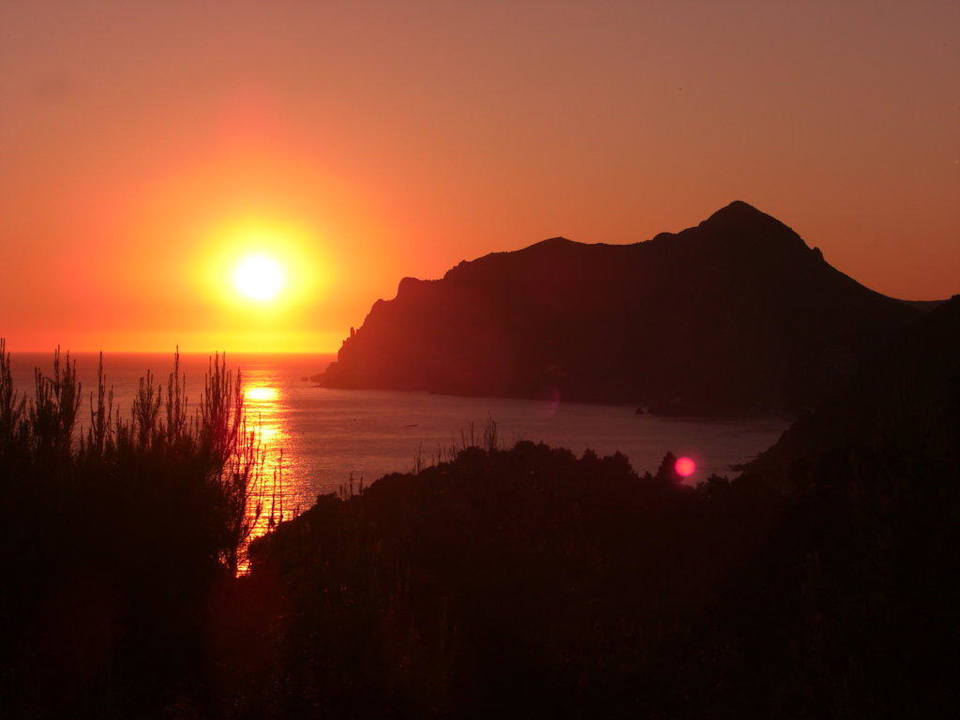 Sonnenuntergang vom Pool aus betrachtet Hotel Ambiente Palace