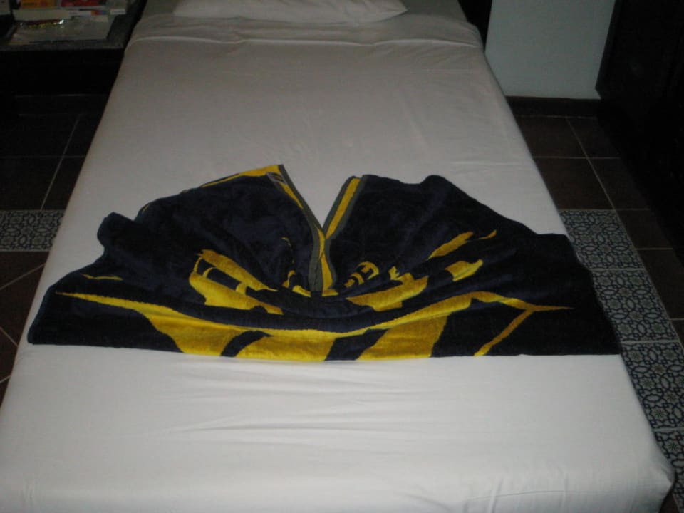 Schöne Deko auf dem Bett Pickalbatros Alf Leila Wa Leila Resort - Neverland Hurghada