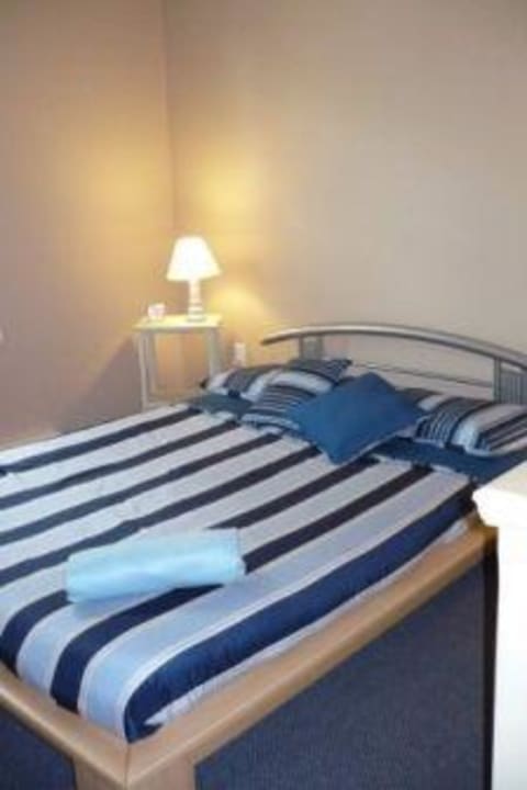 Zweites Schlafzimmer Sluice Point Cottages and Golf