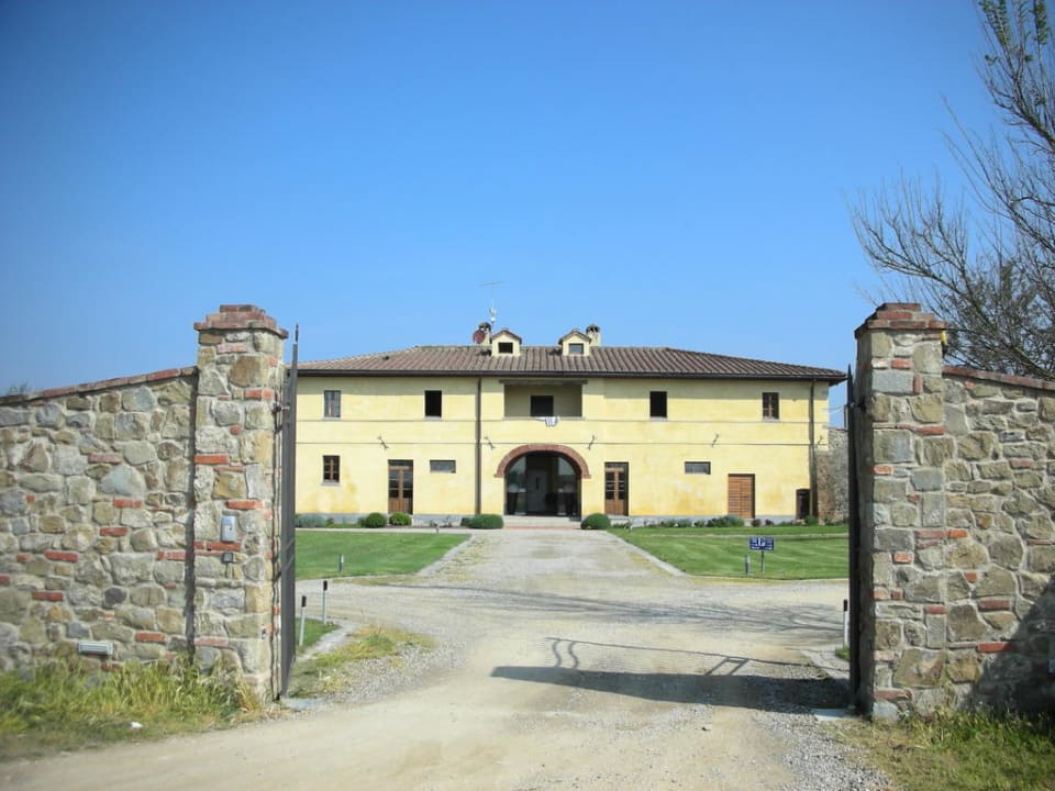 Außenansicht von der Straße Hotel Le Capanne