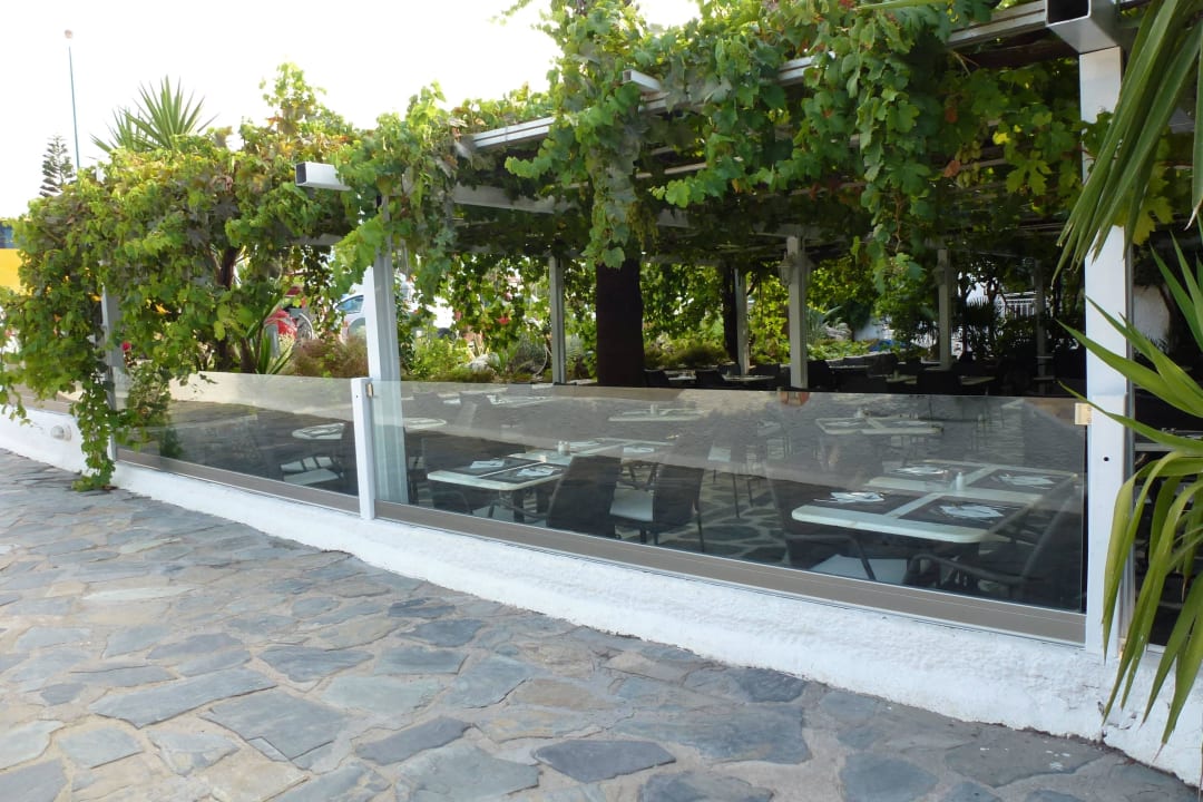 Pergola of the restaurant HARPIN Happy Days Beach Hotel