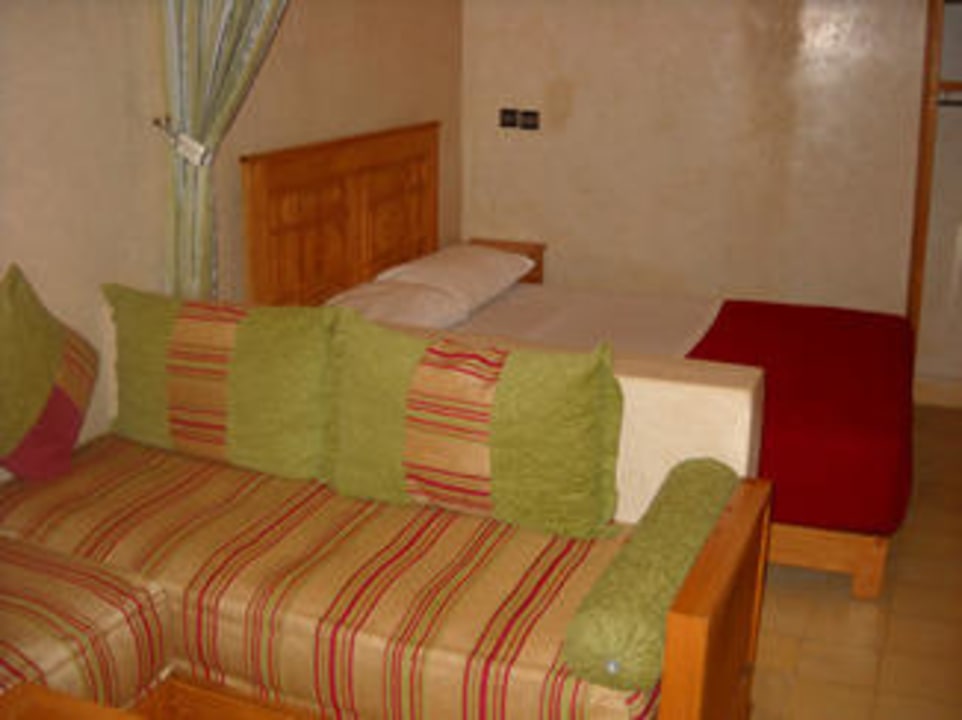 A "mini suite" room complete with sofa seating  Djemaa El Fna Hotel Cecil
