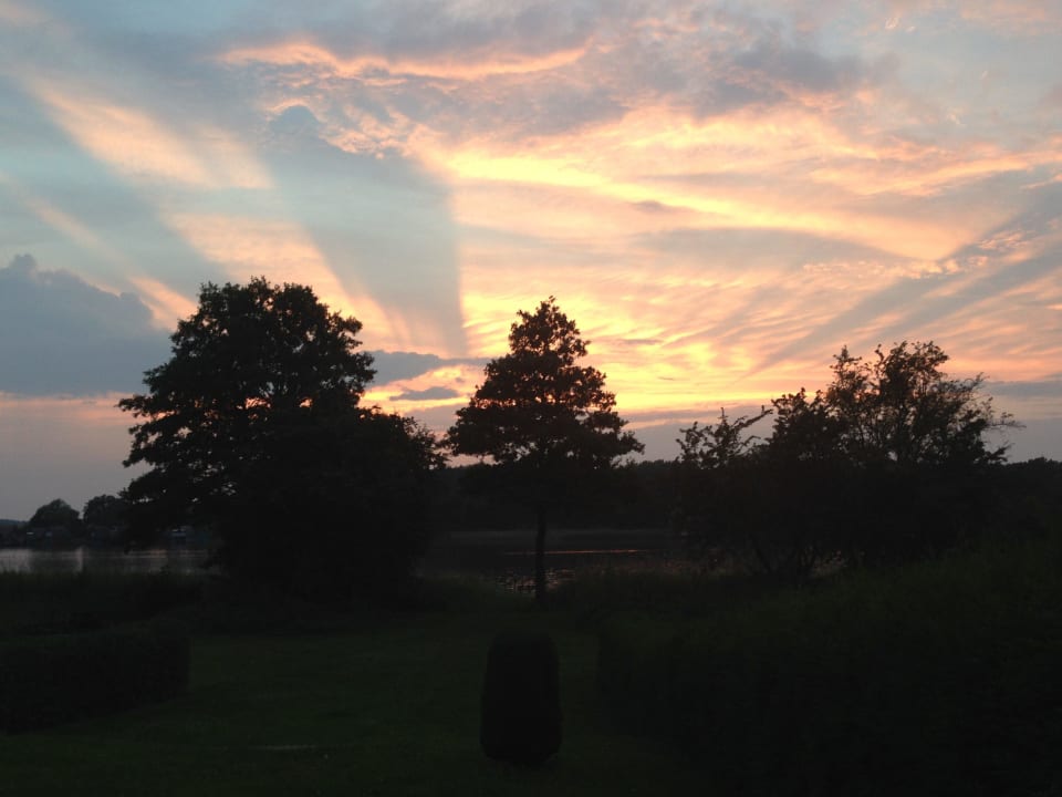 Sonnenuntergang Ferienhaus am See-Ronneberger