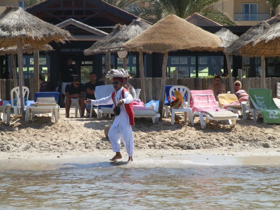 Der lustige Mandelverkäufer Hotel Rosa Beach