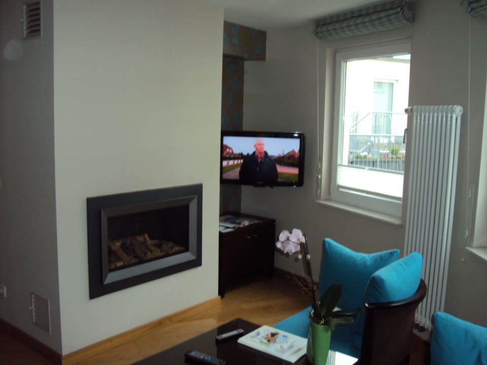 Sitzecke mit Kamin und extra Fernseher Das Ahlbeck Hotel & SPA