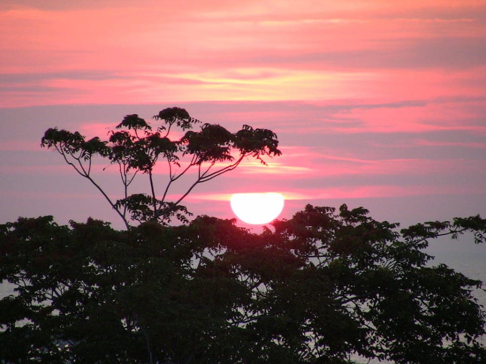 Západ slunce z terasy hotelu Hotel Villa Hibiscus