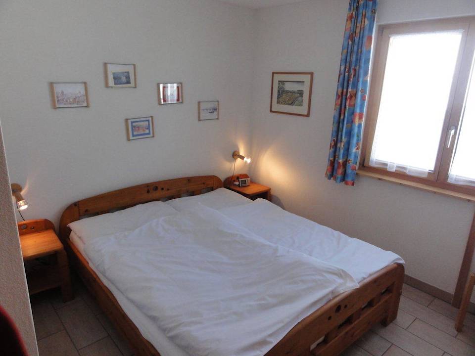 Wg Fischer Schlafzimmer mit Doppelbett Ferienhaus Weisshorn