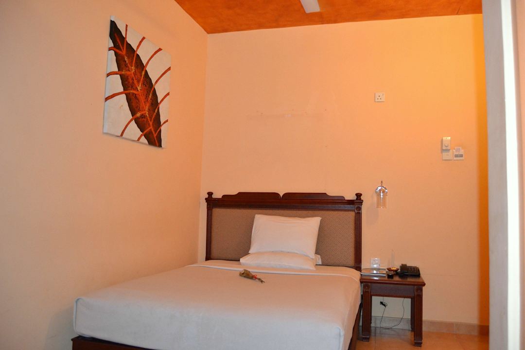 Bett Olympus Plaza Hotel