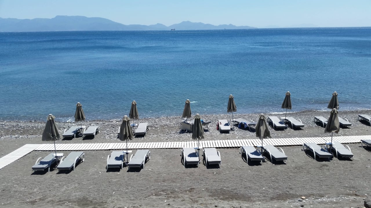 Teil des Strandes Dimitra Beach Hotel & Suites