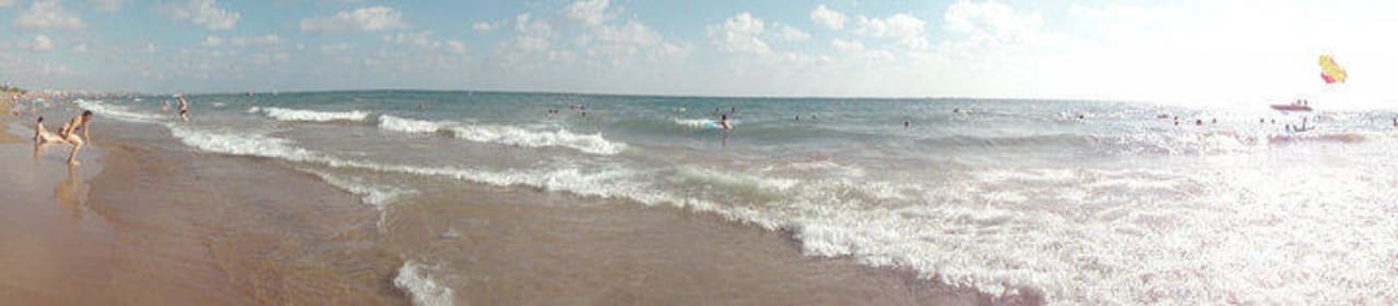 Strand Club Grand Side