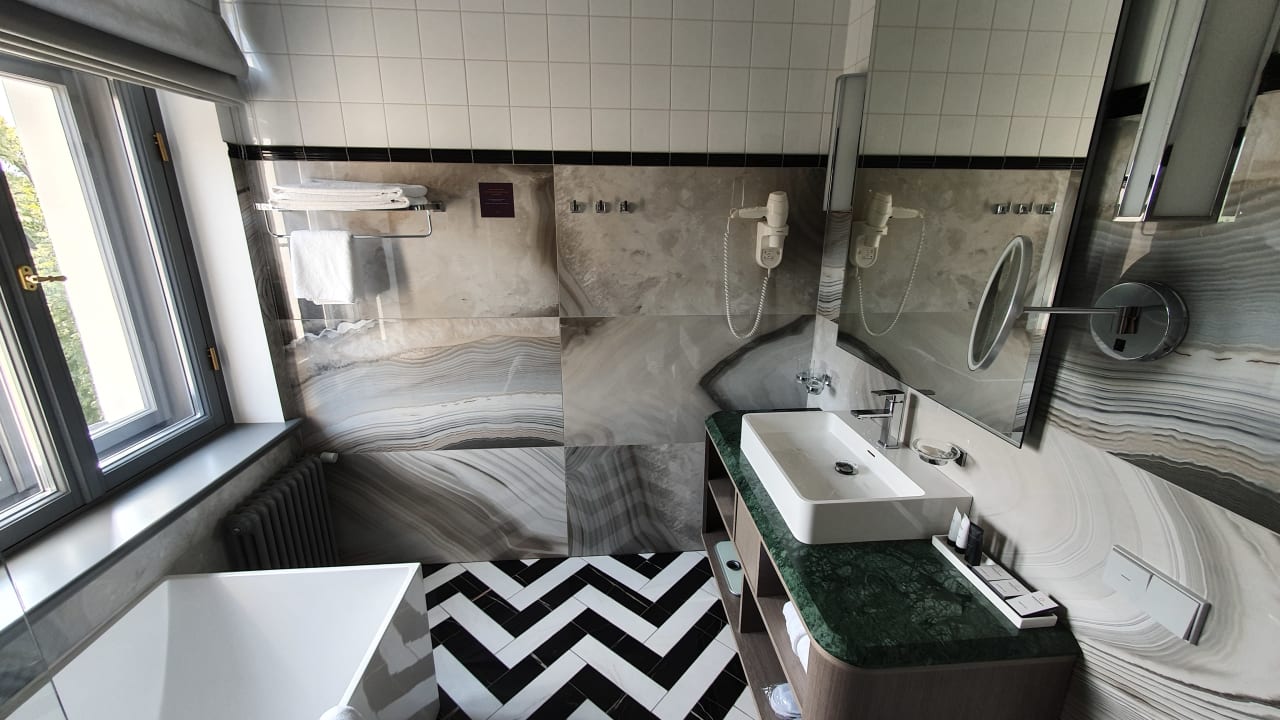 Zimmer Grand Poet Hotel by Semarah