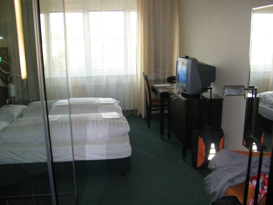 Bett, TV usw. Flemings Hotel Wien-Stadthalle