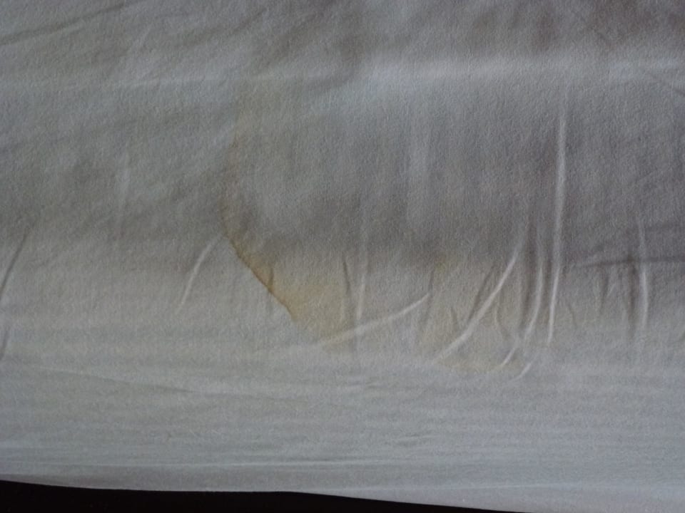 Spannbettlaken auf dem Bett Peace Laguna Resort and Spa