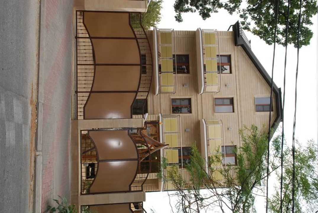 Фасад Casa Cypress / Гостевой дом Кипарис