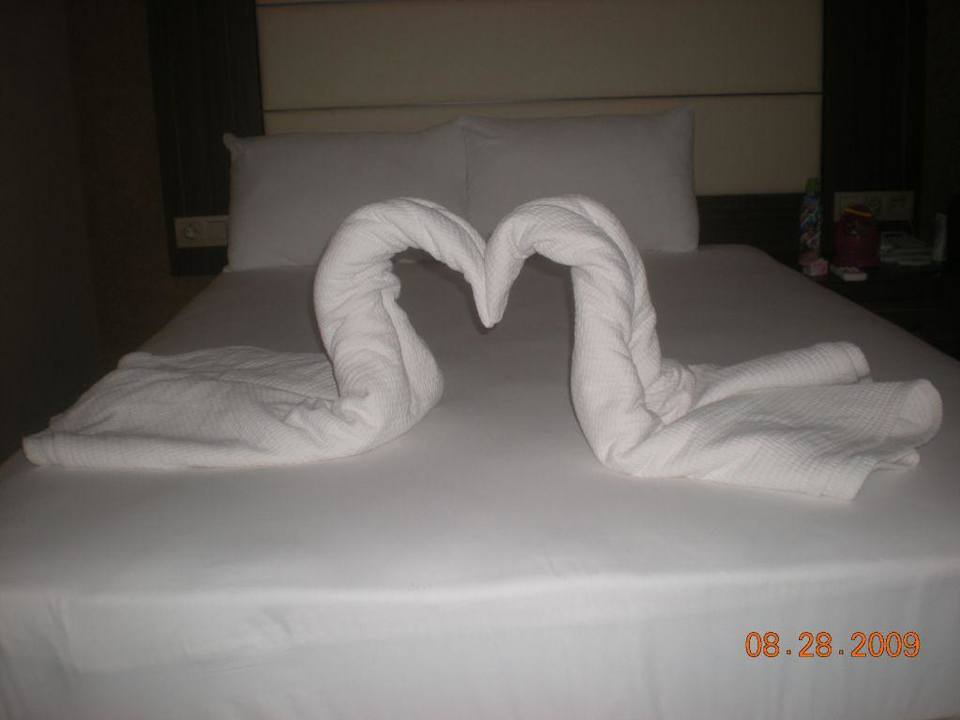 Dekoracja na łózku NoxInn Club