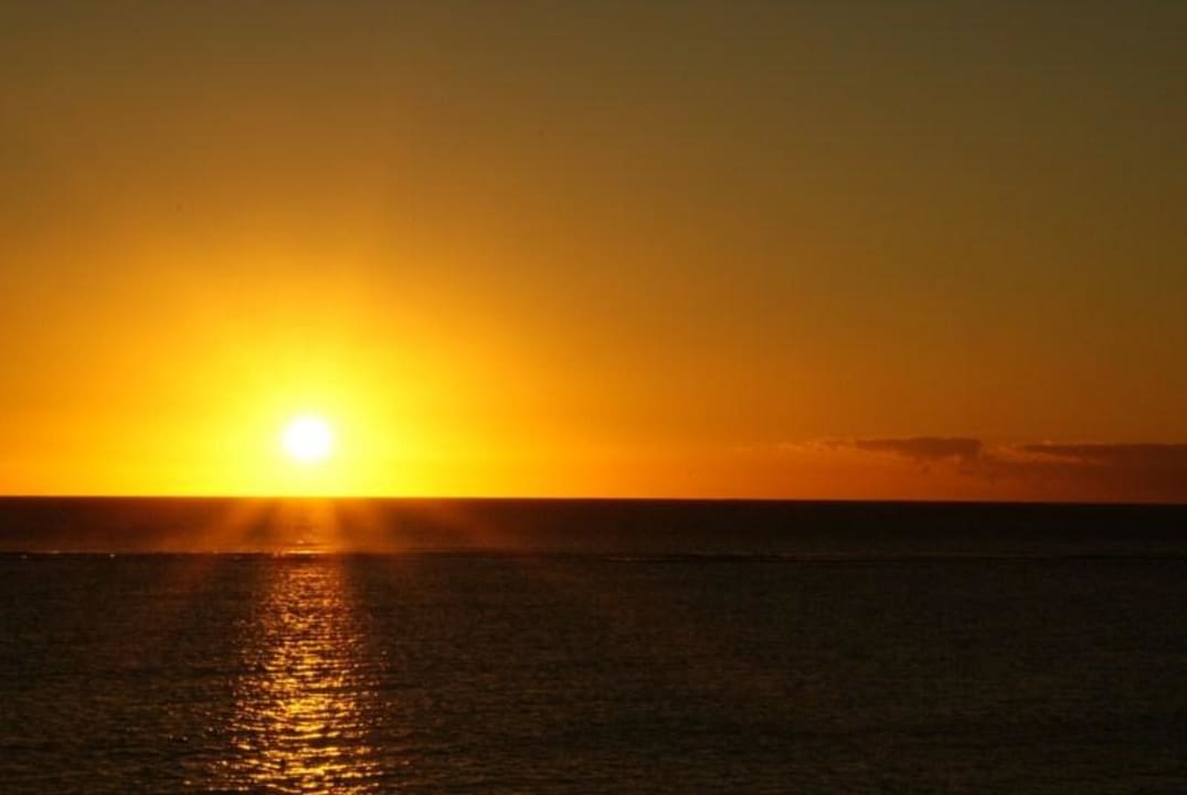 Sonnenuntergang vom Balkon aus foltografiert Pearle Beach Resort & Spa