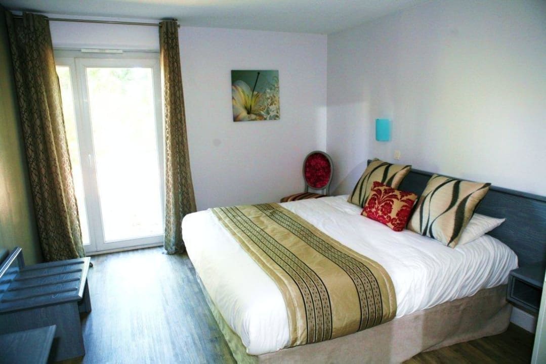 L'une des chambres Best Western Plus Hôtel Hyeres Côte d'Azur