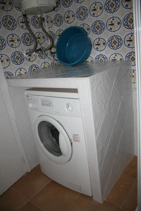 Waschmaschine im Duschraum Hotel Aldea Cala Fornells 2