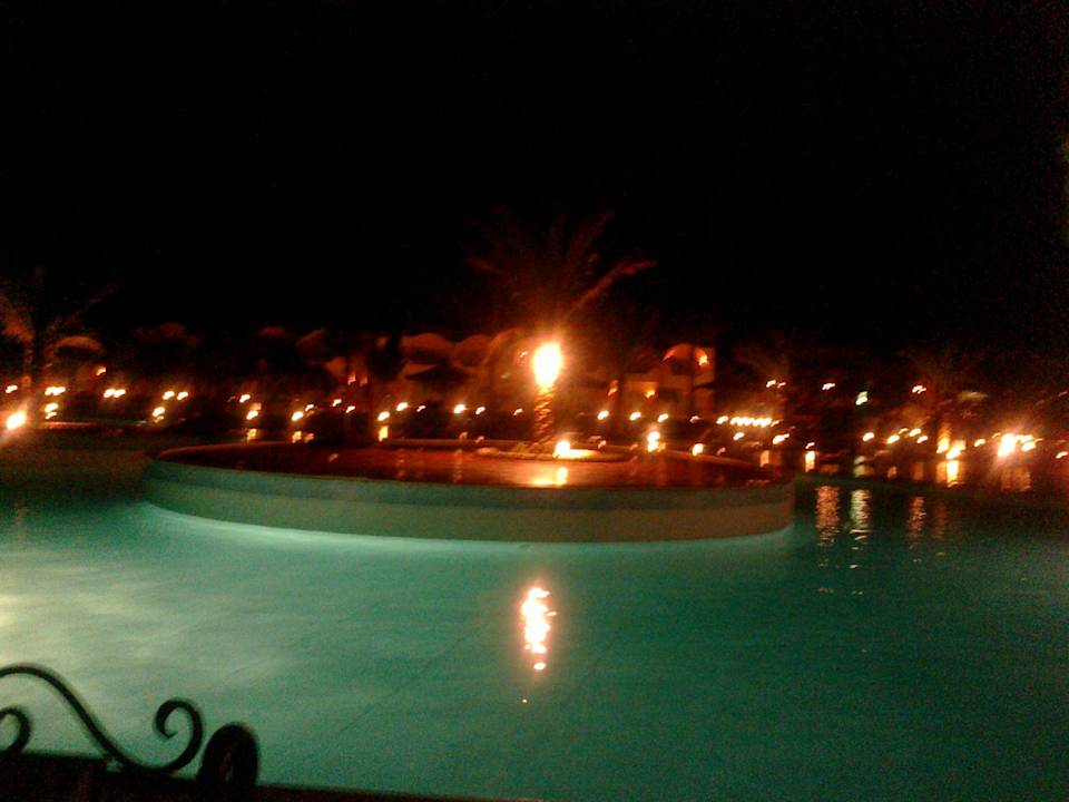 Pool in the evening/night Three Corners Sea Beach Resort