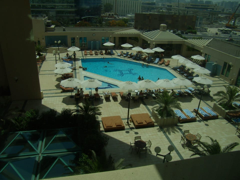 Pool view from our room Mövenpick Grand Al Bustan Dubai