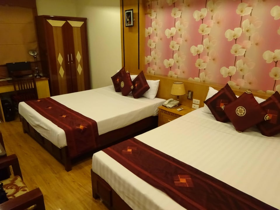 Zimmer mit Bett Hotel Thaison Grand