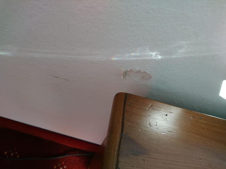 Wand bei Bett Hotel Das Ludwig